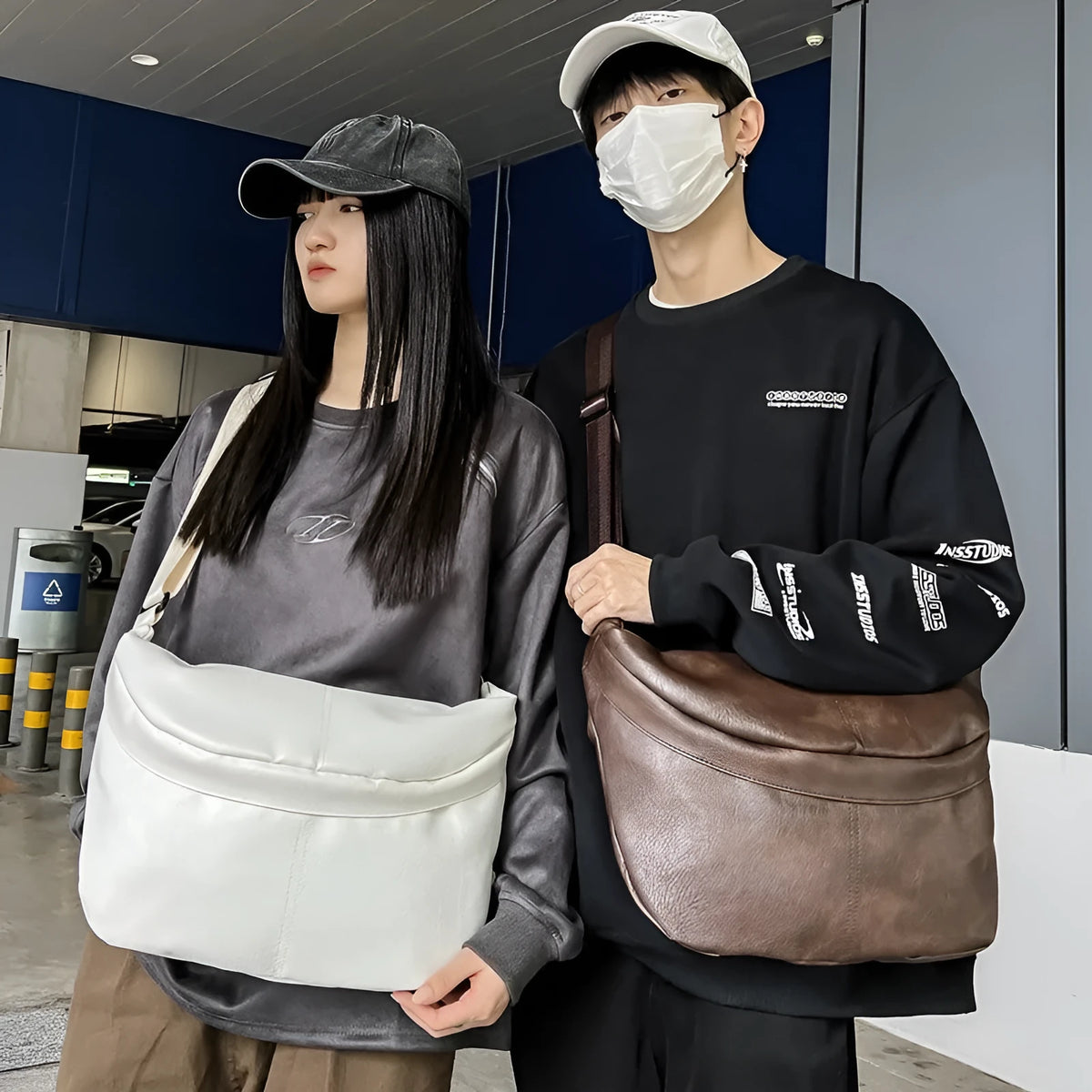 Men's brown vintage PU leather crossbody bag showing large main compartment and slim profile