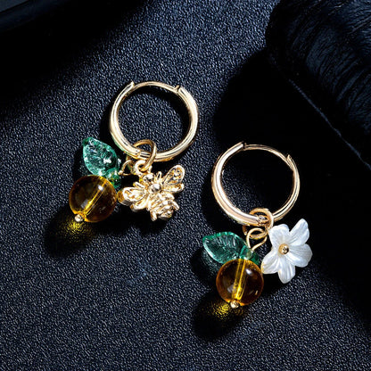 Adjustable women's ear cuffs with bee-shaped pendant, glass leaves, and floral elements in XY-123 colour