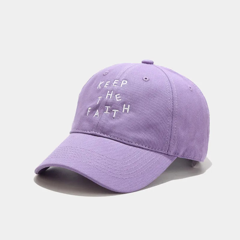 Men's cotton baseball cap with small embroidered letters on front in adjustable dome design