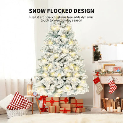 Green and white snow-dusted artificial Christmas tree on a metal stand, showing detailed PVC branches.