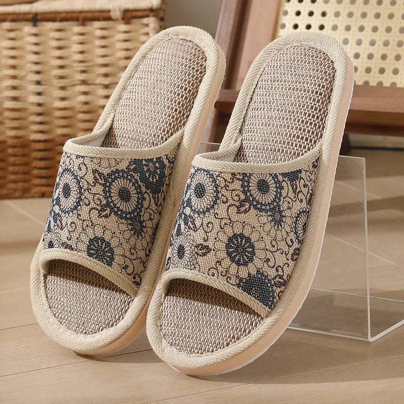 Women's open-toe linen slippers with thick sole in light brown colour.