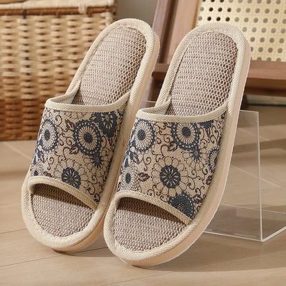 Women's open-toe linen slippers with thick sole in light brown colour.