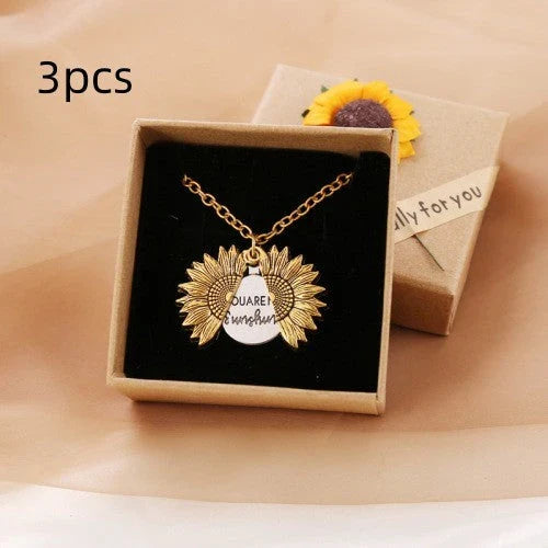 A stunning sunflower pendant necklace with an adjustable chain, crafted from high-quality materials for a radiant and versatile accessory.