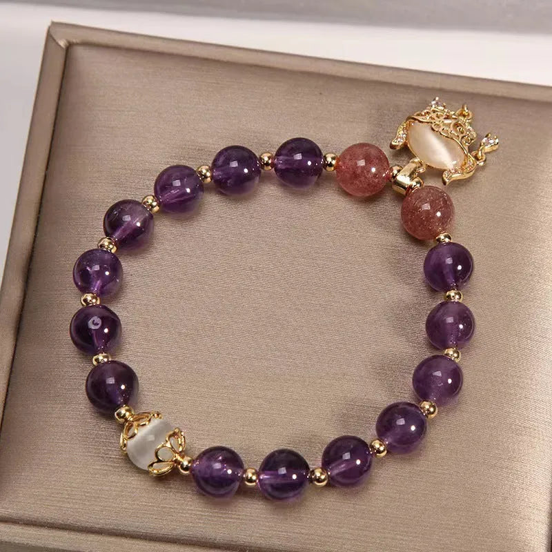 Copper longevity lock bracelet for women with drop-shaped charm, Ruyi and safety lock symbols.