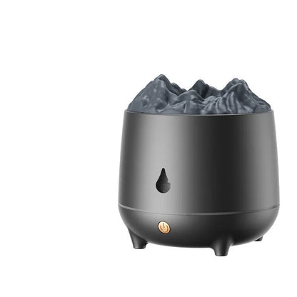 Volcano-shaped white ultrasonic humidifier with mist output on wooden surface