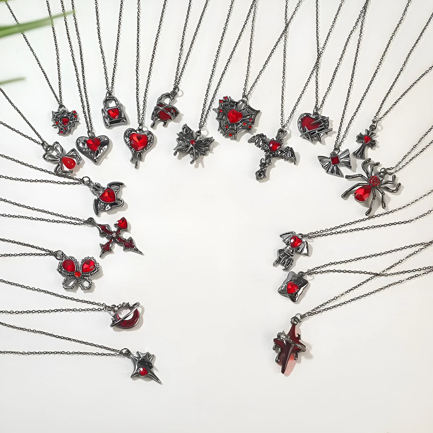 Dark gothic necklace with detailed spider bat pendant on an adjustable metal chain