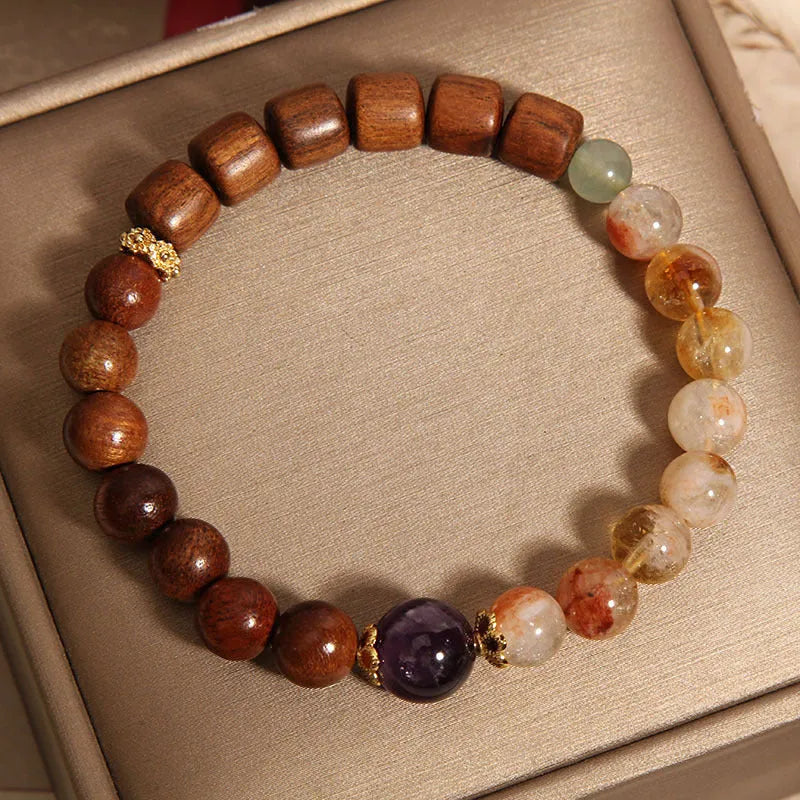 Women's crystal bracelet with yellow tower crystal, ebony amethyst beads, pearl and rhinestone decoration
