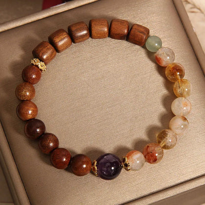 Women's crystal bracelet with yellow tower crystal, ebony amethyst beads, pearl and rhinestone decoration
