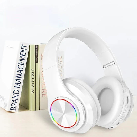 Wireless Bluetooth gaming headphones with colorful LED lighting, offering up to 10 hours of playtime and premium stereo sound quality.