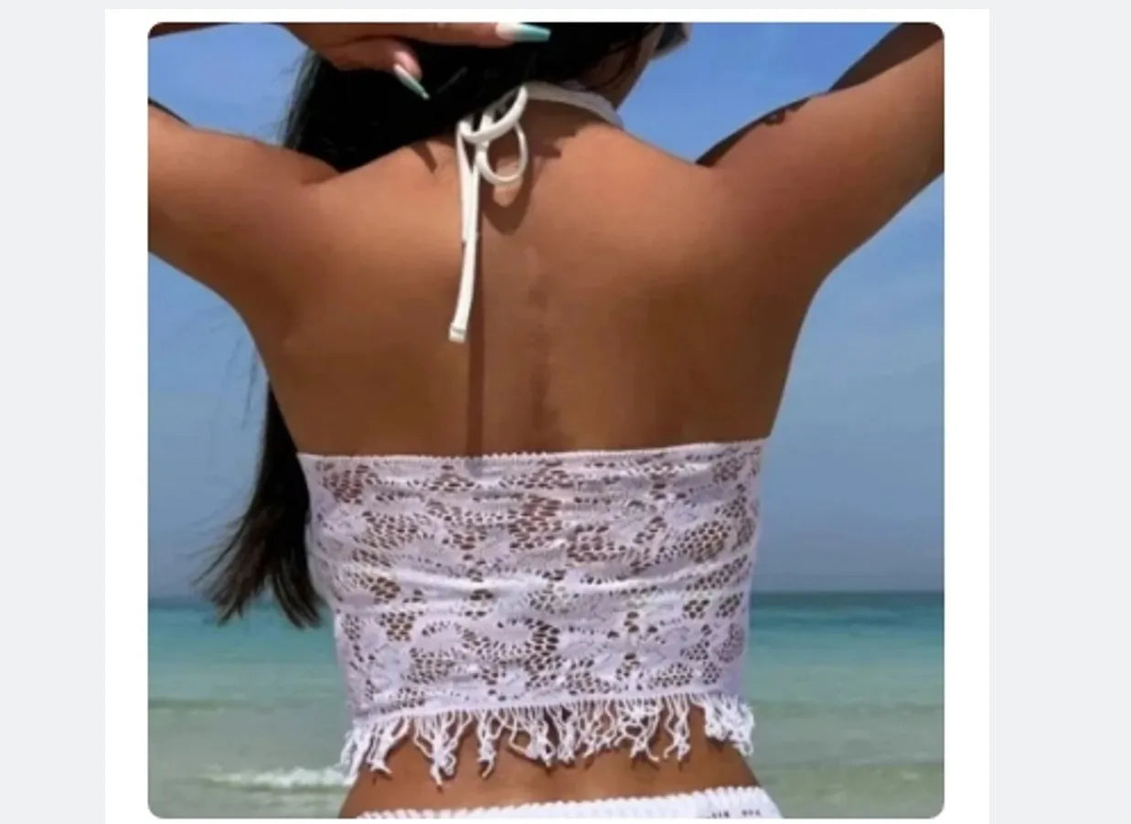 Women's white bikini set with tassel skirt cover-up and lace trim