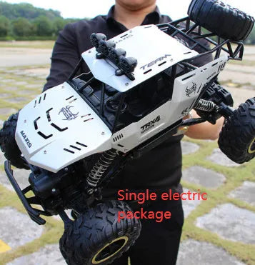 Four-wheel drive remote control car with 2.4G wireless controller on rough terrain