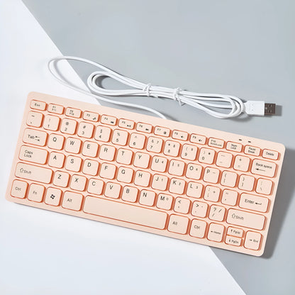 USB wired mini keyboard in four colour options showing compact 280mm design