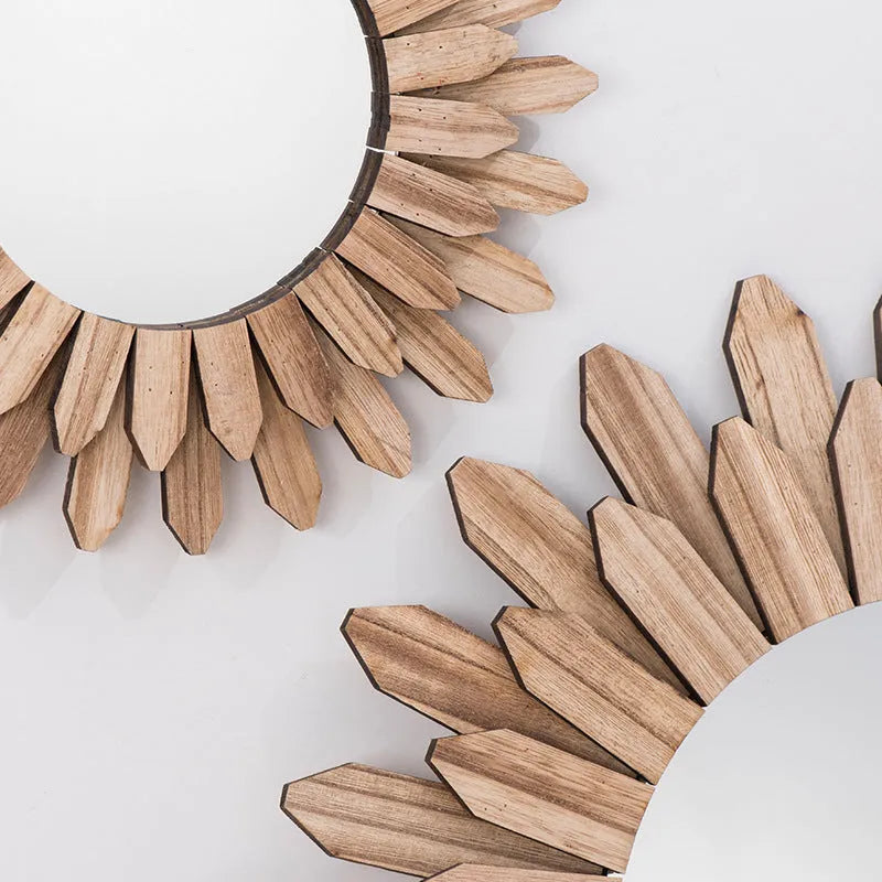 Round European-style solid wood hanging mirror with baked colour frame on a wall.