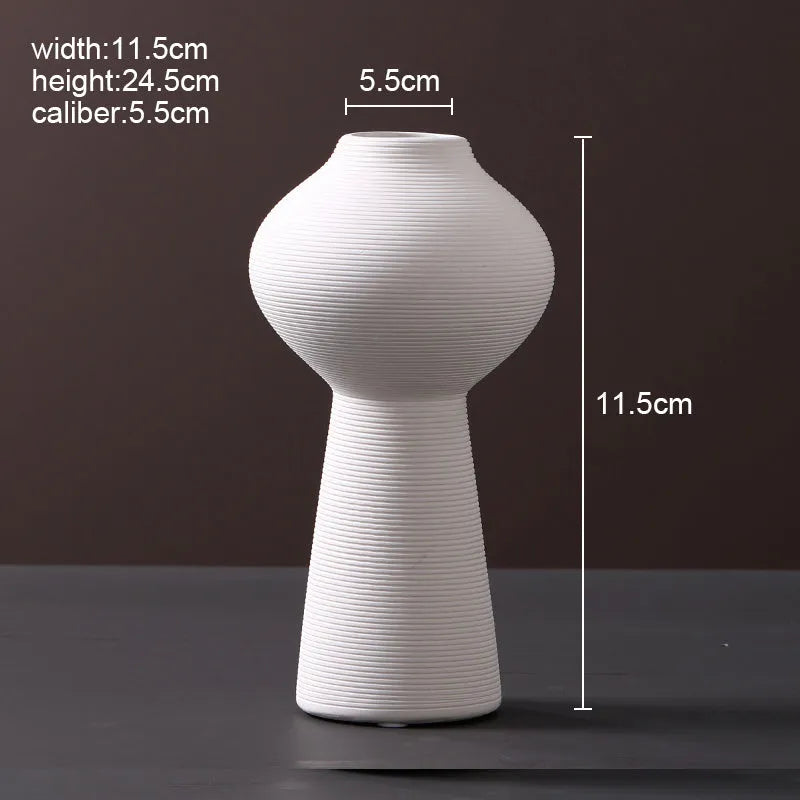 Modern Scandinavian ceramic vase with textured inlay surface decoration