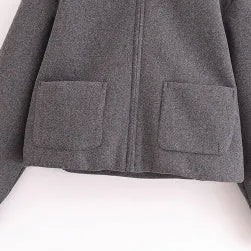 Grey PU women's short jacket with shirt collar, zip front and patchwork splicing, 50cm length