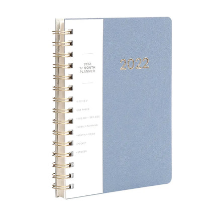 2022 week planner notebook with PU leather cover and coil binding, showing month grid pages