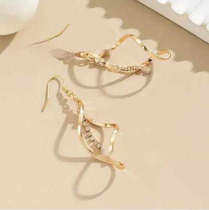 Gold electroplated alloy spiral drop earrings with geometric elliptical design for women