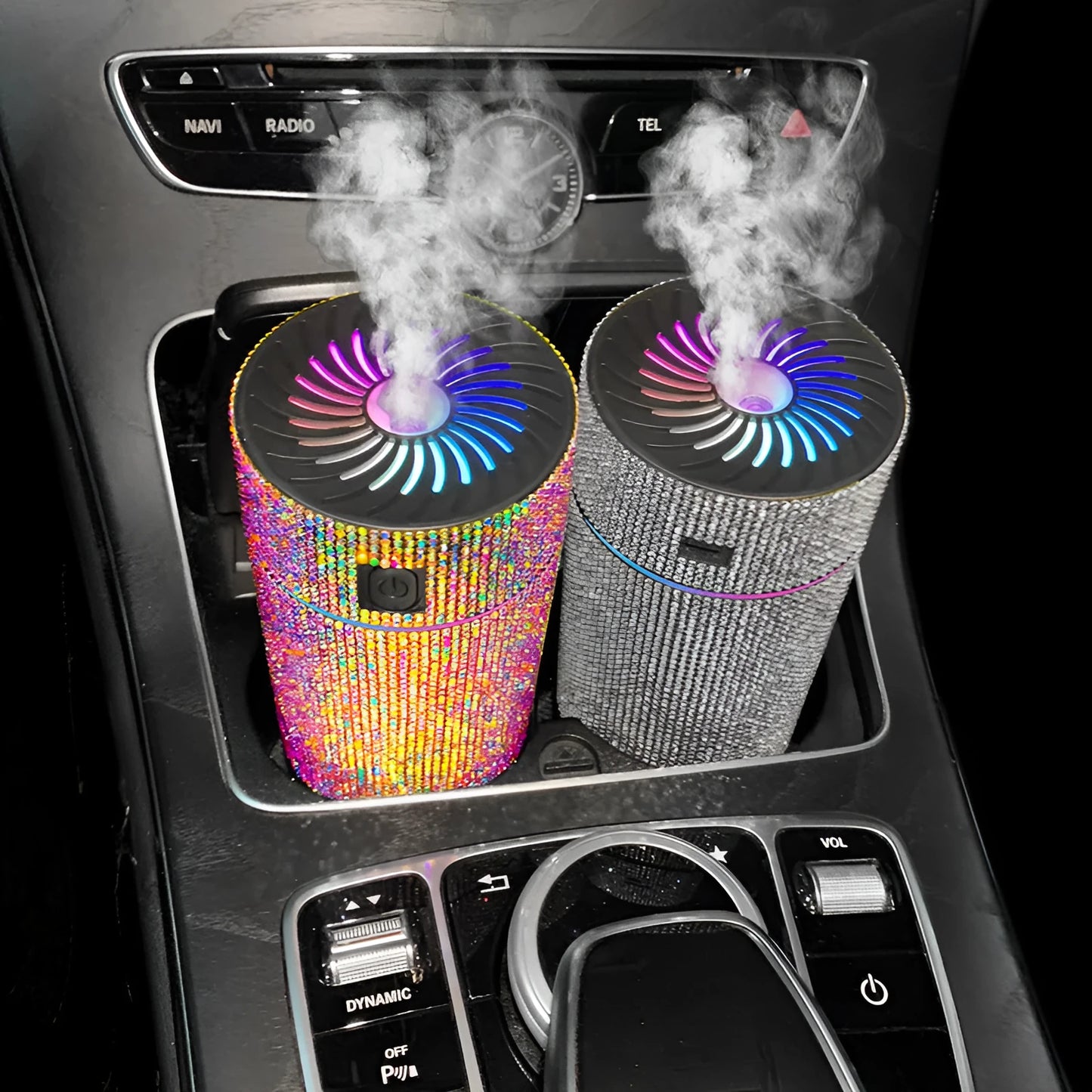 Compact white car air purifier and humidifier unit with USB cable on a car dashboard.