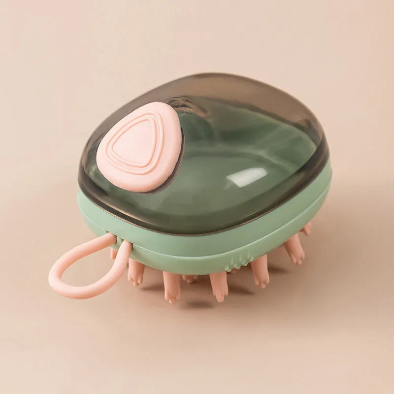 Blue and green pet bath brush with silicone bristles and a shampoo dispenser bottle in hand.