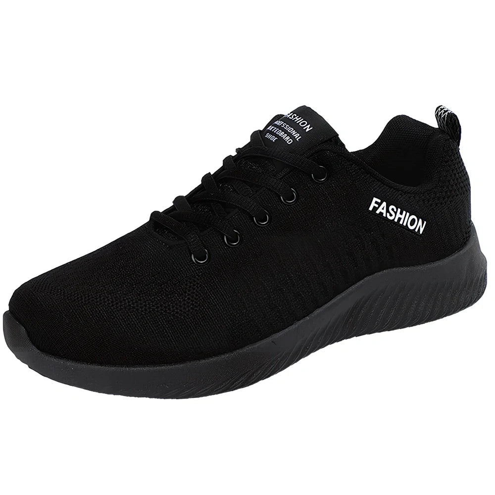 Men's black mesh sports shoes with red accent details and flexible PVC sole construction