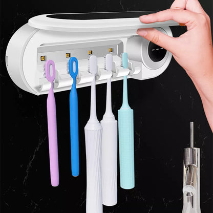 Wall mounted toothbrush holder with UV sterilizer and toothpaste dispenser in ivory white
