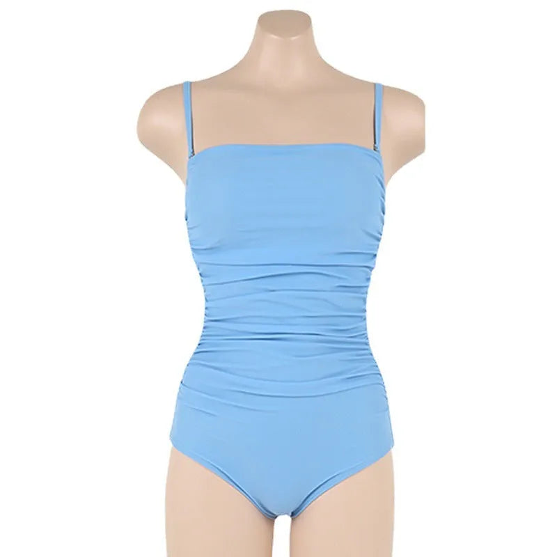 Sling style one-piece swimsuit with belly pleats in solid colour options