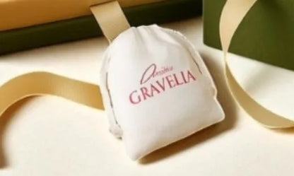 Small white drawstring jewellery bag with flocking texture measuring 12 by 15 centimetres
