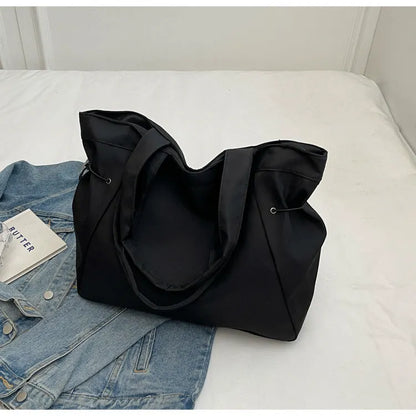 Soft Oxford cloth foldable commuter tote bag in street trend style, shown in available colours.