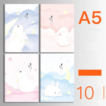 Pack of ten A5 kraft paper thread-bound notebooks with artistic cover designs lying flat.