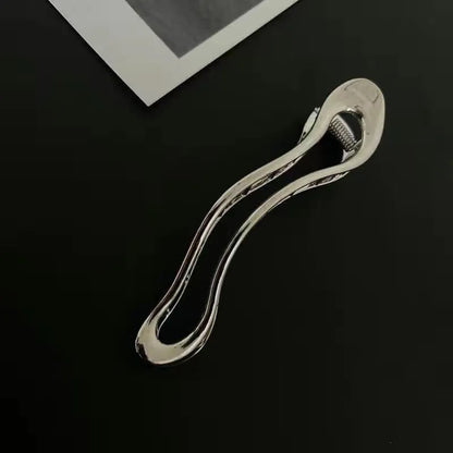 Women's zinc alloy hair barrettes in gold and silver with square, arc, and triangle shapes