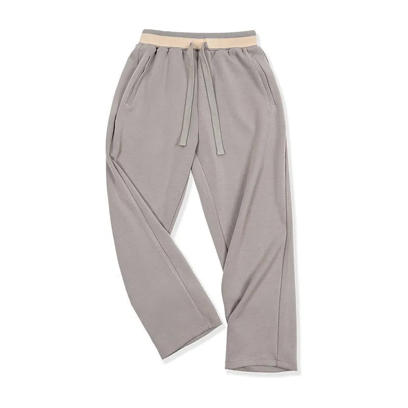 Men's loose straight polyester sweatpants in dark blue, grey or light brown with medium elastic waist and anti-wrinkle finish