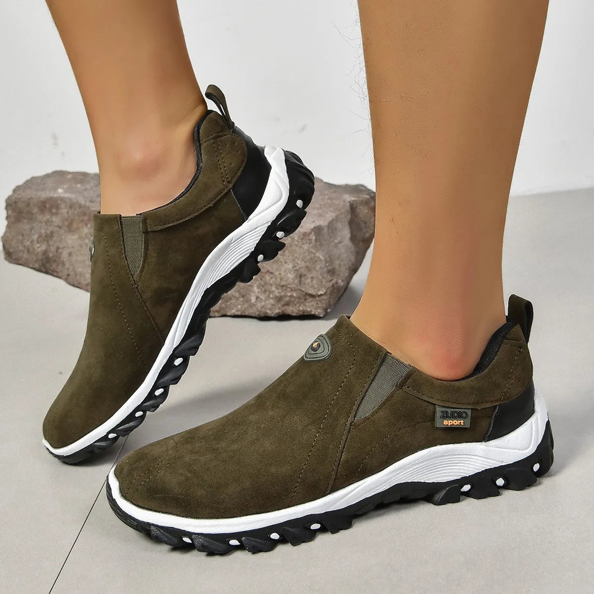 Men's grey round toe slip-on shoes with a shallow mouth on a rubber sole.