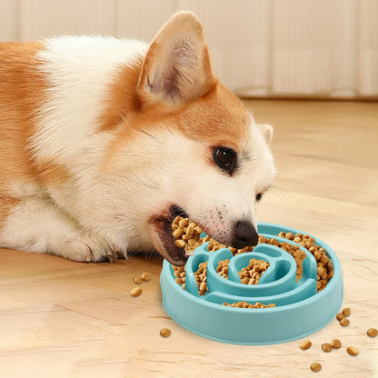 Blue silicone slow feeder dog bowl with raised labyrinth puzzle pattern for dogs.