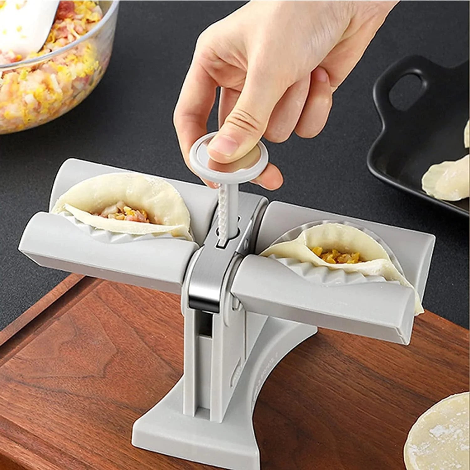 Double head dumpling mould with anti-slip base for efficient kitchen use