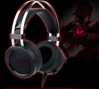 Black wired computer gaming headset with over-ear cups and a 3.5mm jack.
