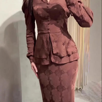 Dark brown long sleeve dress with plant and flower pattern, faux two-piece retro style.