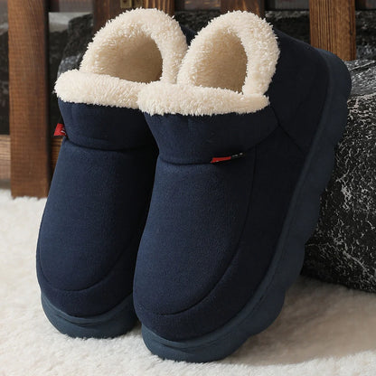 Cosy velvet house slippers for men and women, featuring plush velvet upper, suede lining, and durable rubber soles