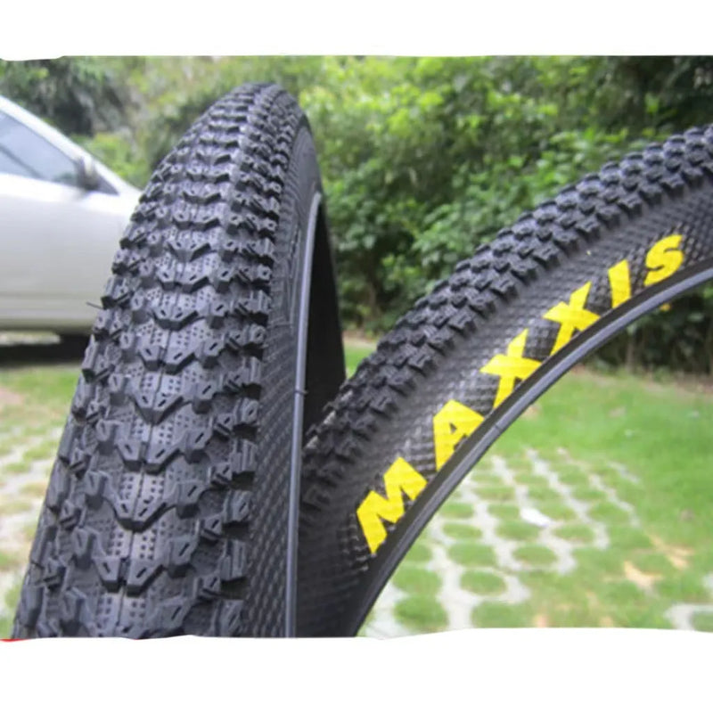 Mountain bike tyre with ultralight puncture-resistant construction, weighing from 520g to 630g per tyre, available in sizes from 26x1.95 to 29x2.1 inches, designed for reduced rolling resistance and improved trail handling.