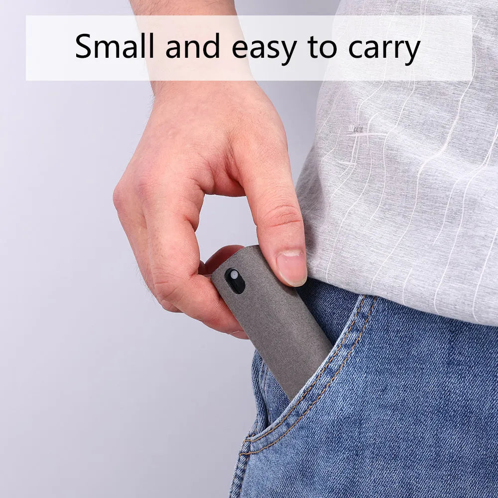 Portable all-in-one screen cleaner kit with protective shell, microfiber wipe, and internal fluid bottle.