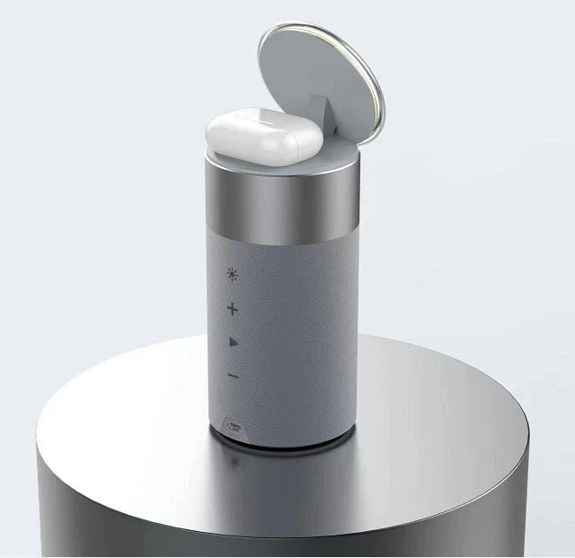 A 3-in-1 device that wirelessly charges iPhones and AirPods, plays Bluetooth audio, and has a touch-sensitive lamp