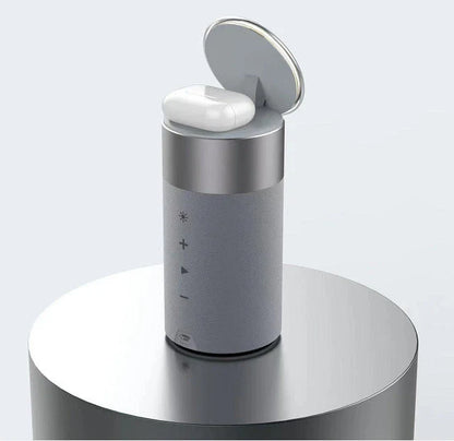 A 3-in-1 device that wirelessly charges iPhones and AirPods, plays Bluetooth audio, and has a touch-sensitive lamp