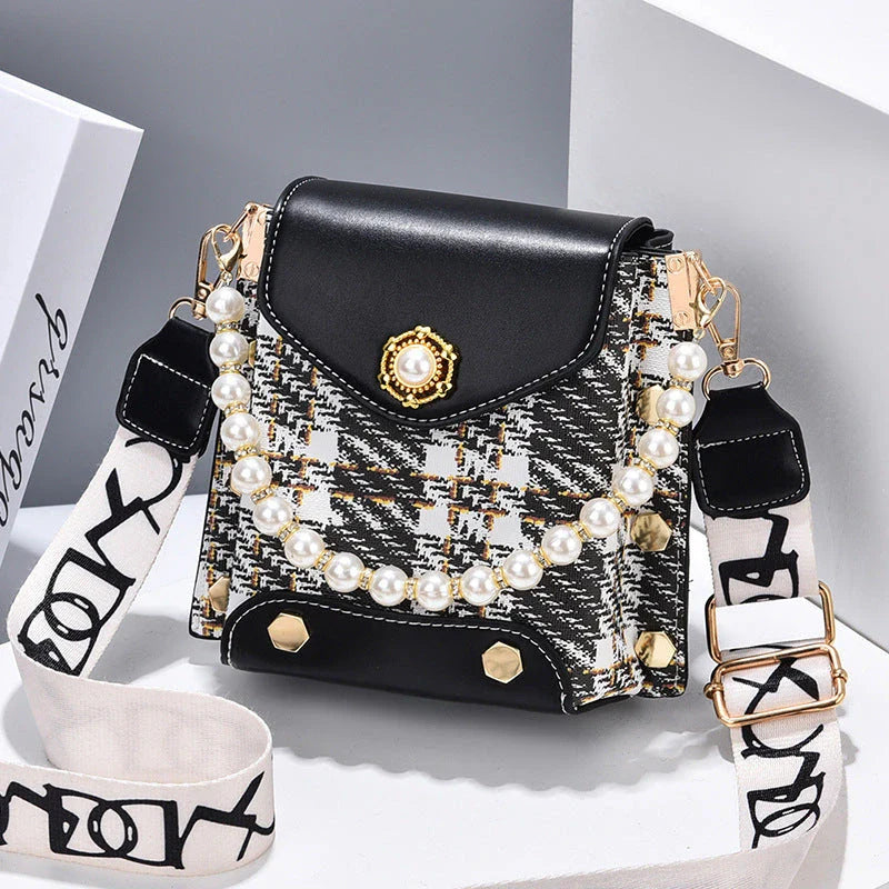 Stylish crossbody bag for women with delicate pearl pendant and adjustable strap for versatile carrying options