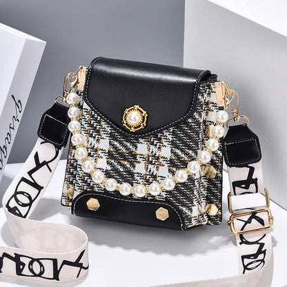 Stylish crossbody bag for women with delicate pearl pendant and adjustable strap for versatile carrying options