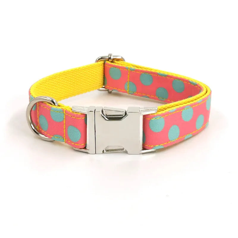 Yellow polka dot dog collar and lead set with coordinating bow, available in five sizes