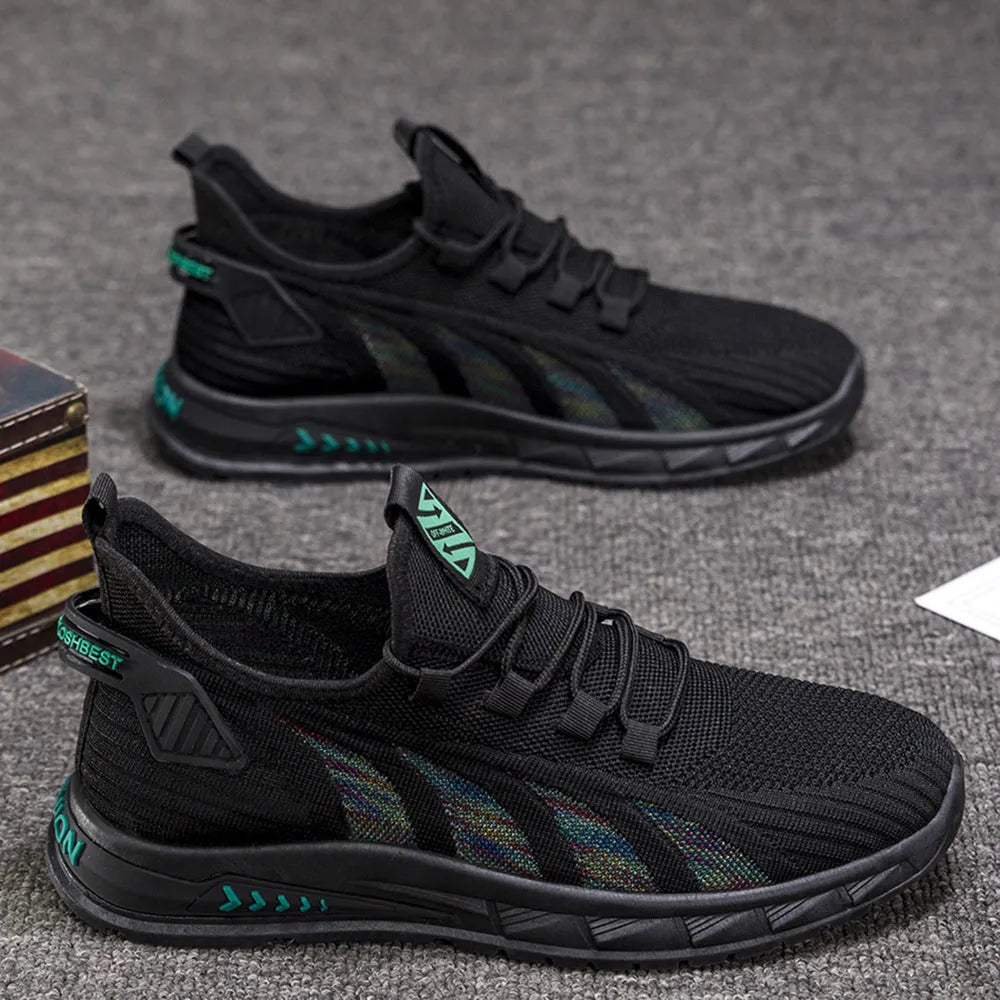 Low-top casual sneakers with striped mesh upper and flat plastic sole in grey colour.