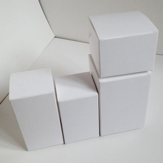 White paper storage boxes showing various sizes from 3x3cm to 7x7cm bases with different heights