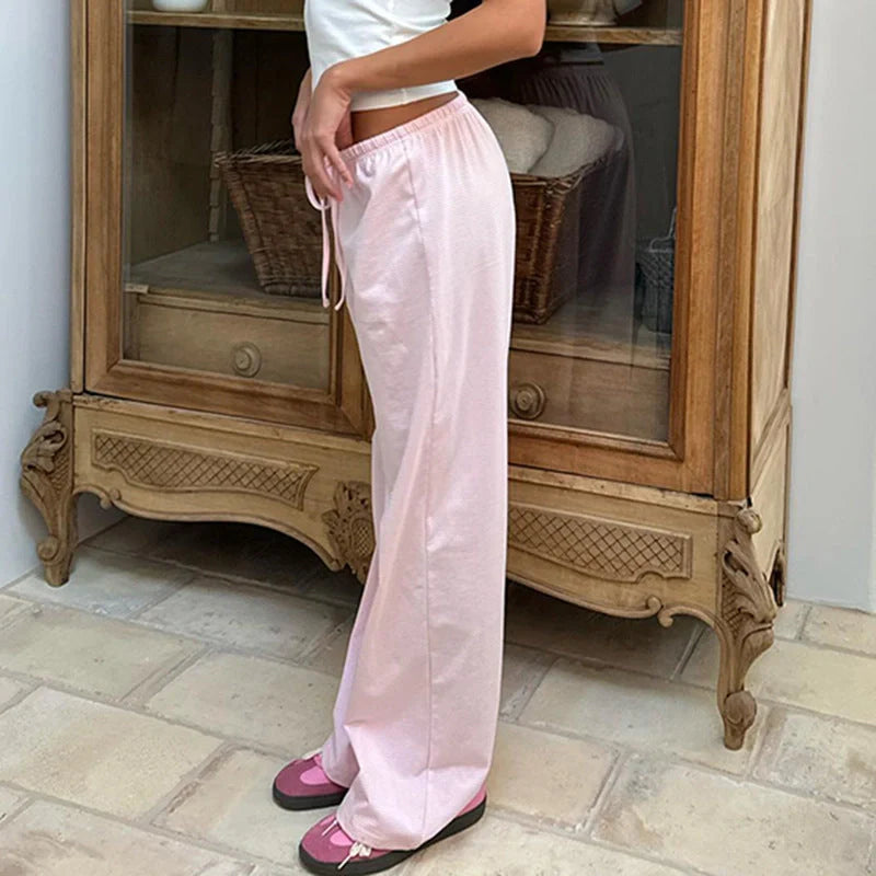 Stylish women's striped wide-leg trousers with lace-up detail in various colors