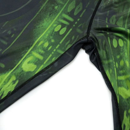 Man wearing a slim-fit, long-sleeved printed ZF016 sports suit for running and fitness.
