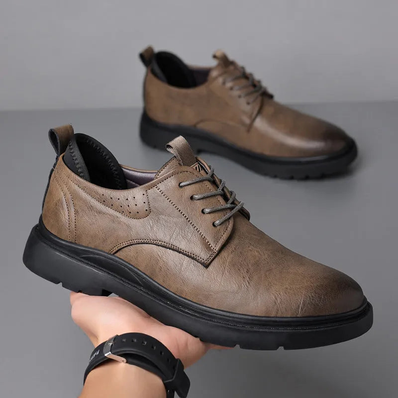 Men's black and brown leather shoes with rubber sole and sewing line detail for business and casual wear