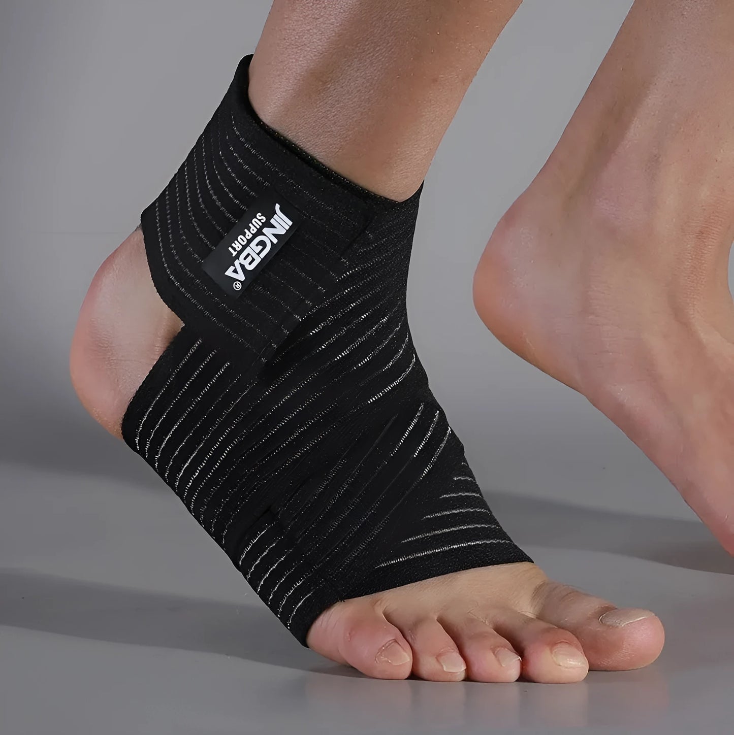 Adjustable elastic sports ankle bandage in black or khaki for basketball running cycling